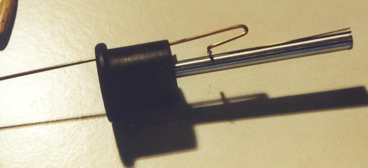 Close detail of a reed pipe's tongue and shallot assembly used in tuning and voicing