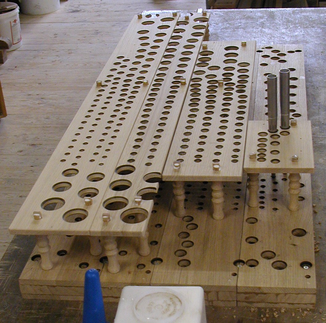 A pre-assembled pipe toe-board (Pfeifenstock) drilled for mechanical action rebuild
