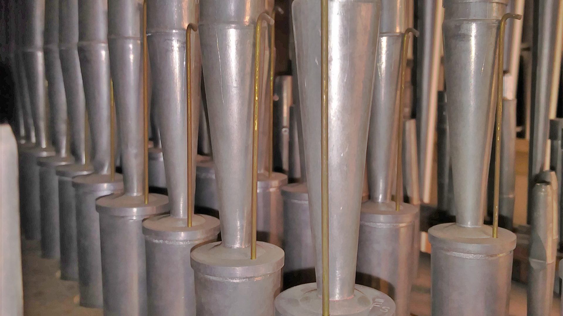 Close view of a Dulzean 16-foot reed pipe rank, tuning and voicing detail